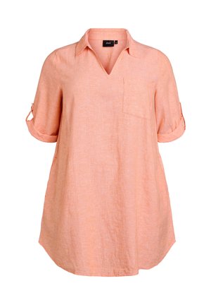 Light orange linen shirt with a V-neck, short rolled sleeves, and a front pocket. Features a relaxed fit and slightly curved hemline.