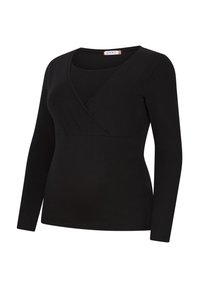 Schwarzes Langarmshirt mit Überkreuz-Design, rundem Ausschnitt und glattem, dehnbarem Stoff. Schlicht und figurbetont geschnitten.