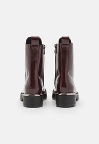 DKNY Stivaletti con plateau - bordeaux
