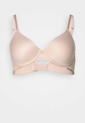 Soutien-gorge rembourré beige avec des coques lisses, des bretelles ajustables, des accents en dentelle et une fermeture à crochets au dos. Détail décoratif en métal doré au centre.