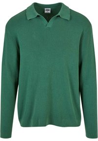 Grüner gerippter Pullover mit Kragen und V-Ausschnitt. Lange Ärmel und eine lockere Passform, gefertigt aus weichem Strickmaterial. Keine auffälligen Muster.