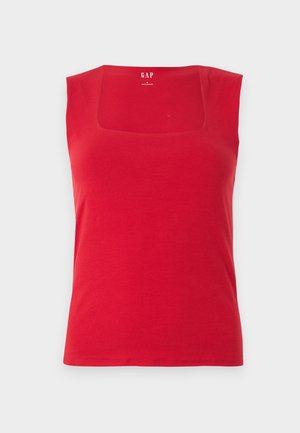 Débardeur rouge en coton avec un décolleté carrée et des bretelles larges. Texture lisse, coupe ajustée et logo de la marque imprimé à l'intérieur.
