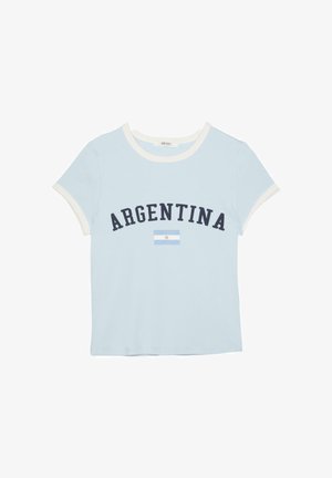 Light blue short-sleeve T-shirt with white trim, black "ARGENTINA" text and a small Argentina flag below the text on the front.