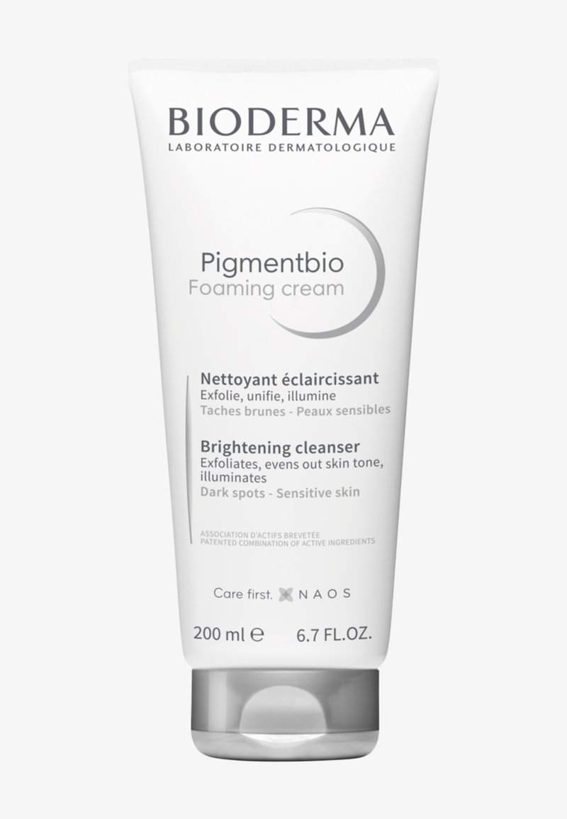 Bioderma Pigmentbio crème moussante nettoyante éclaircissante pour peau sensible, exfolie, unifie le teint, traite les taches foncées, tube de 200 ml.