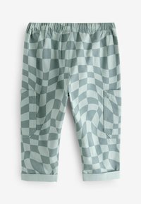 Hellgrüne Hose mit einem wellenförmigen Karomuster, elastischem Bund, umgeschlagenen Säumen und zwei Seitentaschen für Funktionalität.
