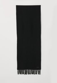 Black scarf made of soft fabric with a smooth texture, featuring long fringes at the ends and a small logo label.
