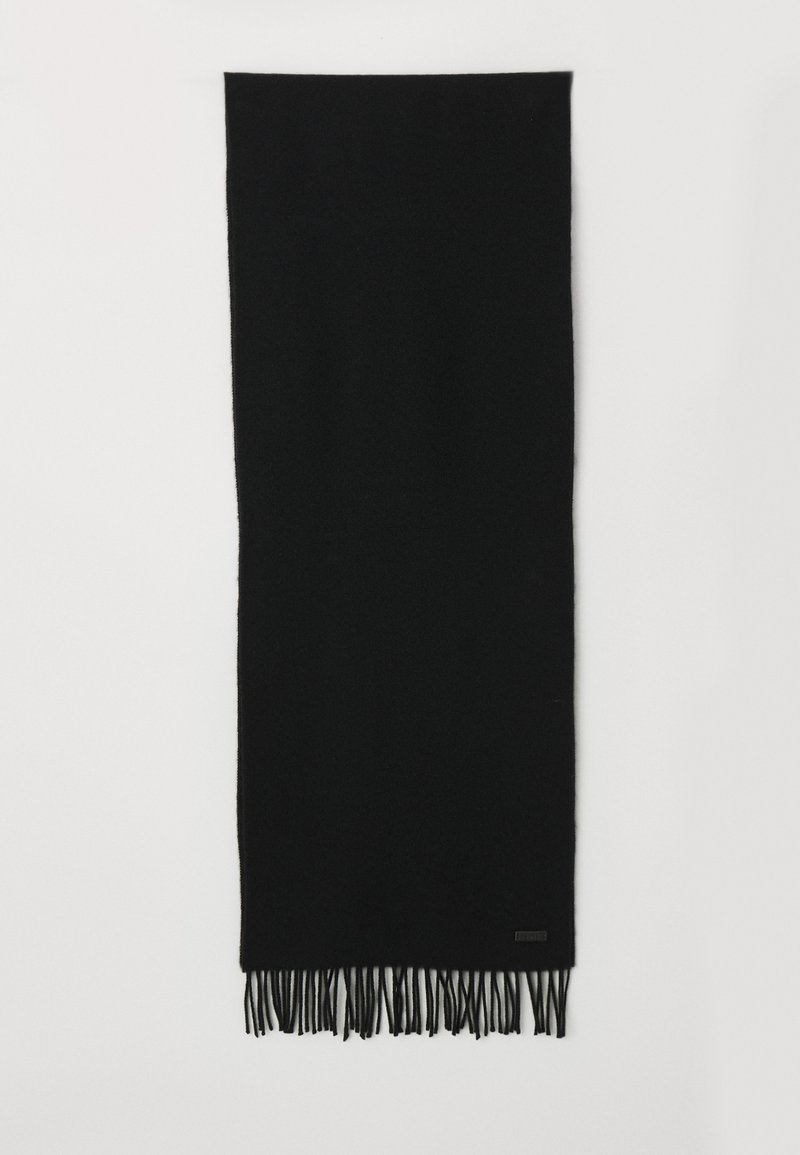 Black scarf made of soft fabric with a smooth texture, featuring long fringes at the ends and a small logo label.