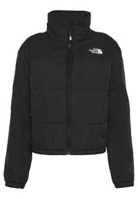 Black puffer jacket with high collar, zip front, elastic cuffs, and hem. Features horizontal stitching and a small logo on the left chest.