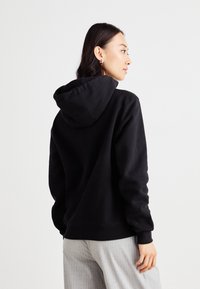 Calvin Klein Jeans OFF PLACED MONOLOGO HOODIE  - Felpa - black