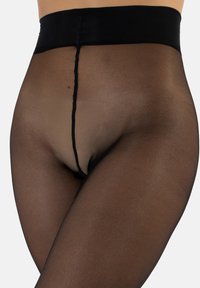 Tights negros transparentes con una cinturilla alta y un diseño sin costuras, con una textura suave y una apariencia ligeramente translúcida.
