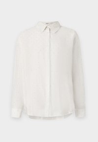 Hvit skjorte med knapp foran, laget av glatt stoff, med subtile prikkemønstre og klassisk krage. Lange ermer med kneppede mansjetter.