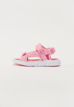 Rosa barnsandaler med en strukturerad ovandel, stjärnmönster, justerbara kardborreband och en fläckig vit sula.