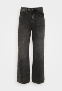 Mustat leveälahkeiset farkut, jotka on valmistettu denimistä. Niissä on korkea vyötärö, hienovarainen haalistuminen, etutaskut ja nappikiinnitys.