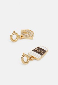 Gold-tone earrings featuring a leaf charm with rhinestones and a coffee cup charm with enamel detailing in brown and white.