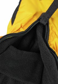Yellow and black insulated glove with a zippered opening; interior lined with soft black fleece for warmth and comfort.