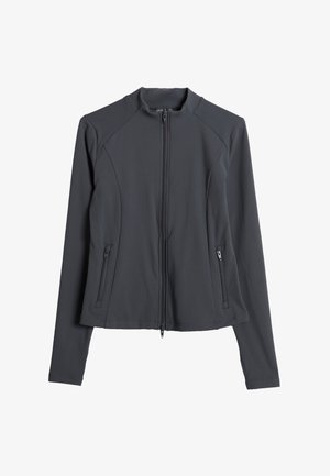 Veste à manches longues gris foncé avec fermeture éclair frontale et deux poches latérales zippées, dotée d'une coupe ajustée sans col.
