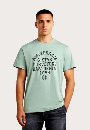 T-shirt imprimé - hellgrün