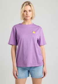 Purple cotton T-shirt with a round neckline and short sleeves, featuring a small yellow lemon embroidery on the left chest area.