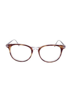 Montatura rotonda per occhiali da vista tartarugata marrone con lenti trasparenti e sottili aste metalliche, posizionata al centro su uno sfondo bianco.