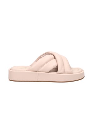 Ljust rosa klematis-sandaler med tvärgående remmar, tillverkade av mjukt material, med en platt vit sula och en slät yta.