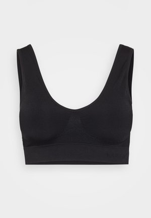 Bralette nera realizzata in tessuto morbido ed elastico. Presenta spalline larghe, una profonda scollatura a giro e un design senza cuciture con un pannello centrale testurizzato.