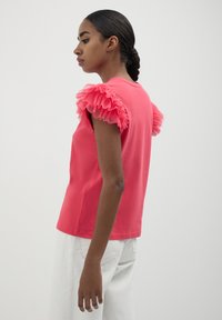 Calliope T-shirt con stampa - rosso