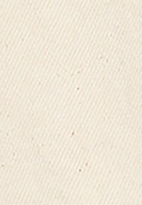 Tissu beige texturé avec un motif en côtes diagonales subtil, featuring des petites paillettes incrustées tout au long pour ajouter du détail.