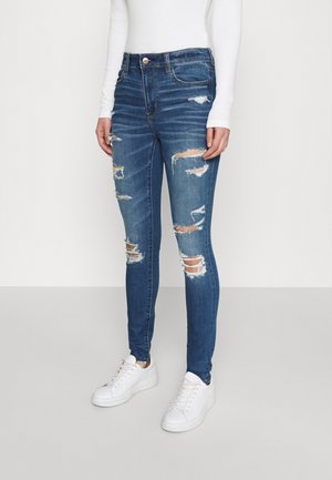 Jean slim - destroyed denim