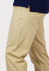 U.S. Polo Assn. Vászonnadrágok - beige