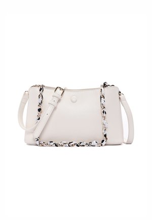 Small white leather crossbody bag with adjustable strap and decorative chain woven with black and white fabric.