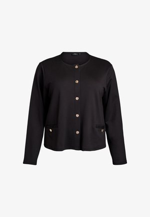 Musta neulecardigan pyöreällä pääntiellä, pitkillä hihoilla ja kultasävyisillä nappikiinnityksillä. Sisältää kaksi etutaskua ja sileän pinnan.
