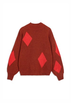 Red knit sweater with long sleeves and a ribbed neckline, featuring large pink diamond patterns on the front and sleeves.