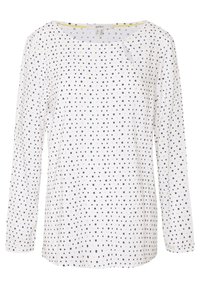 Camicia a maniche lunghe di colore bianco con un motivo a pois neri e dorati. Presenta un colletto rotondo e un tessuto morbido e leggero.