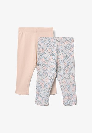 Dos pares de leggings para niños pequeños, uno en beige claro liso y otro con un patrón floral pastel en tonos azul, rosa y beige.