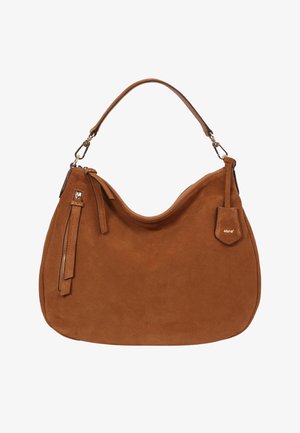 Brown suede handbag with a curved shape, top handle, zip closure, and a decorative tassel. Features a small logo patch and sleek hardware.
