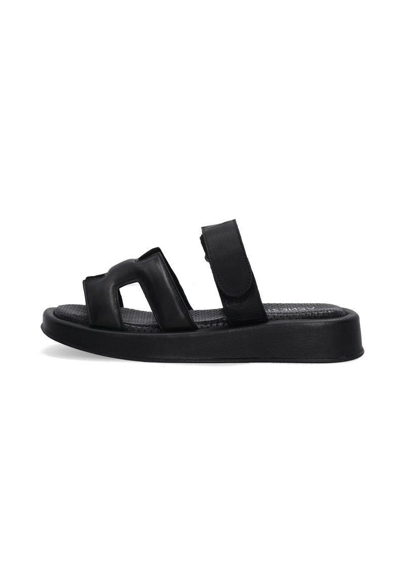 Sorte slidesandaler har en glat læderoverdel med to brede stropper og velcro-lukninger. Tekstureret indersål og flad gummisål.