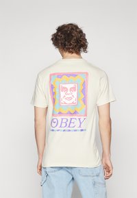 Obey Clothing THROWBACK UNISEX - Marškinėliai su spaudiniu - cream