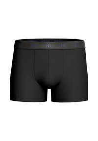 Black boxer shorts made from soft fabric. Features a seamless design and an elastic waistband with contrasting logo accents.