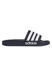 Black slide sandal with three white stripes and "adidas" logo. Made from soft material with a textured surface, featuring a contoured footbed.