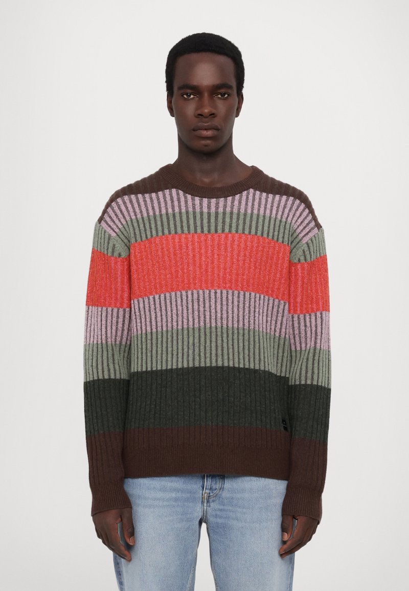 Multicolored ribbed knit sweater with horizontal stripes in red, pink, green, brown, and dark green; crew neckline and long sleeves.