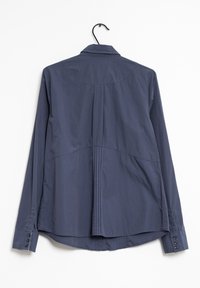 Navy long-sleeve button-up shirt with a pointed collar, back pleats, and cuffs featuring three buttons, made from smooth fabric.