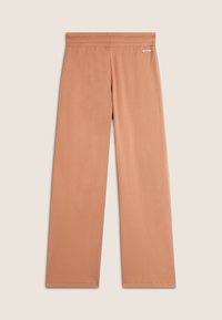 Pantalones de pierna ancha en un suave color terracota, confeccionados en una tela lisa con una cinturilla cómoda y un detalle de etiqueta minimalista.