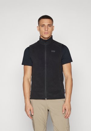 Black fleece vest with a high collar, front zipper, and side pockets. Smooth texture, featuring a subtle logo on the chest.