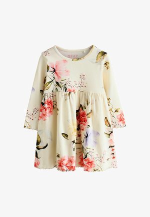 Blumenkleid mit langen Ärmeln, einem cremefarbenen Hintergrund, gerippter Textur und Blumenmustern in Pink, Lila und Rot mit gewelltem Saum.