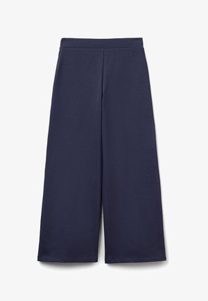 Pantalon large bleu marine en tissu texturé. Caractérisé par une ceinture lisse et un petit détail de logo sur le côté.
