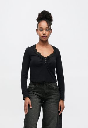 Hosszú ujjú felső - black
