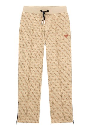 Pantalon beige à motif avec petits logos répétés, taille élastique avec cordon noir, patch logo marron sur la cuisse droite et fermetures éclair aux ourlets des chevilles.
