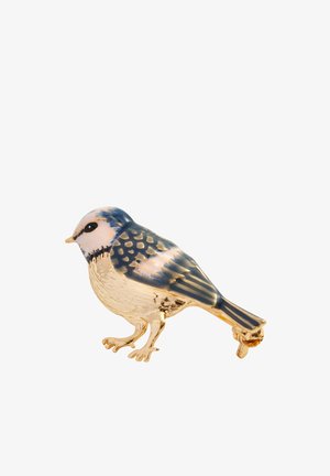 Keraaminen lintuveistos, jossa on sinivalkoinen höyhenkuvio, kultainen jalusta ja yksityiskohtaiset siivet. Ominaisuuksina pyöreä vartalo ja pienet jalat.