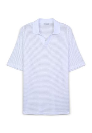 Polo shirt bianco a maniche corte con un tessuto a nido d'ape dalla consistenza testurizzata e un colletto piatto a contrasto. Presenta un design con scollatura a V.
