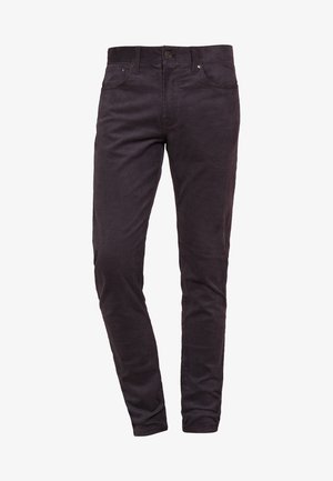 Jeans negros de corte ajustado, hechos de una mezcla de algodón. Presentan un diseño clásico de cinco bolsillos con remaches de metal y cierre de cremallera.
